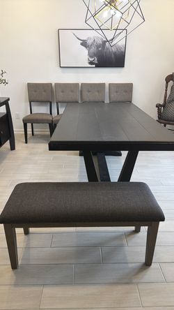 Ashley dinning room table and chairs and one bench