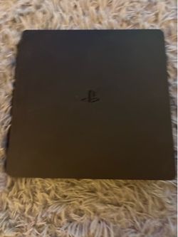 PS4 console with controllers