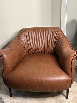 Brown Cozy leatherette chair