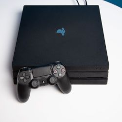 ps4 pro with 4 games n both cords n basic wired headset in perfect condition