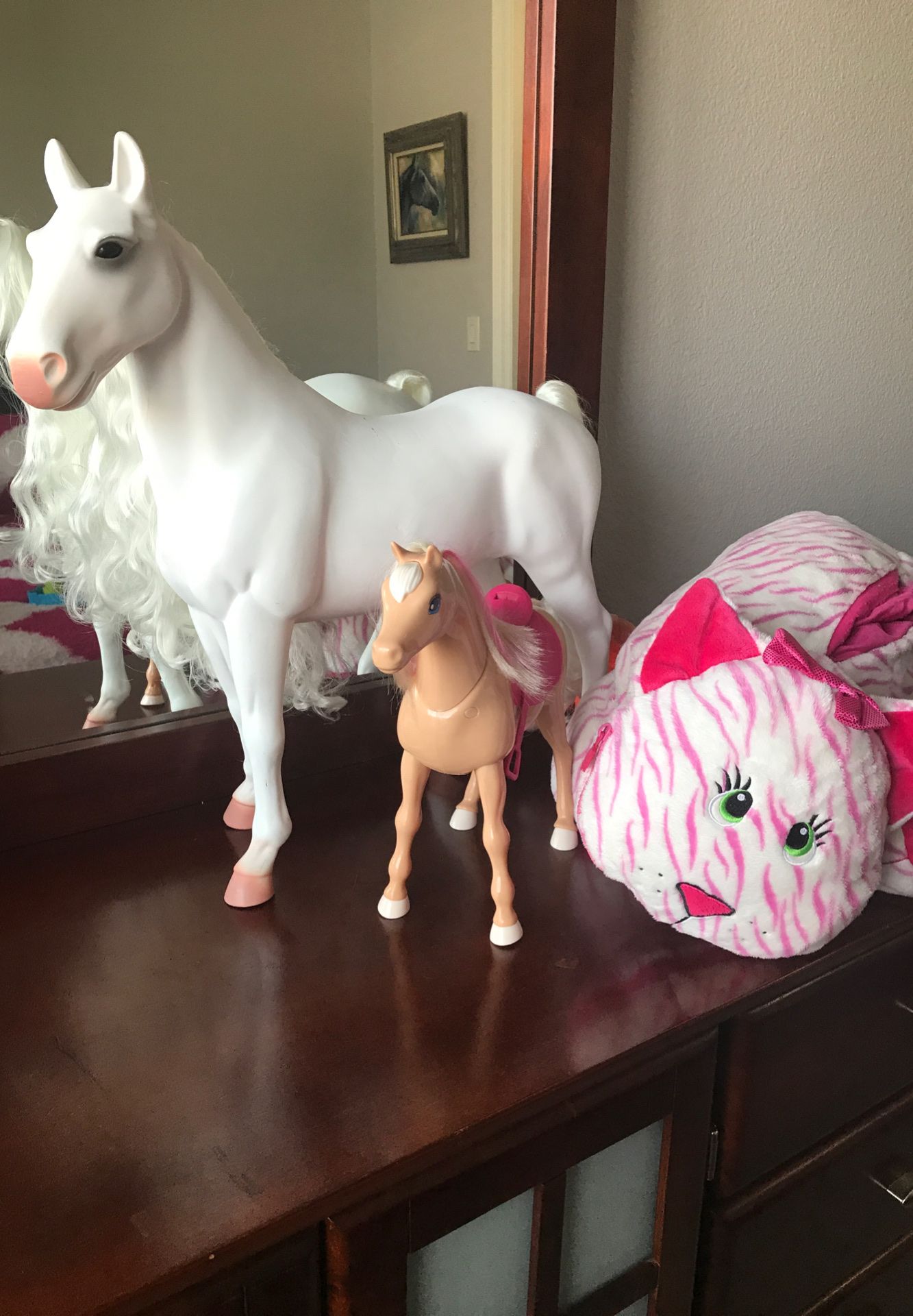 Horses and stuffed animal with pockets