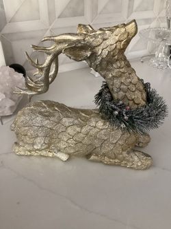 Reindeer silver/gold glitter in box ($24.99 on box) from Cracker Barrel 12” x 7” (perfect condition. See photos)