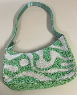Green and white beaded bag