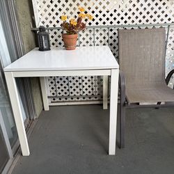 IKEA White indoor/outdoor table, wood top and metal base