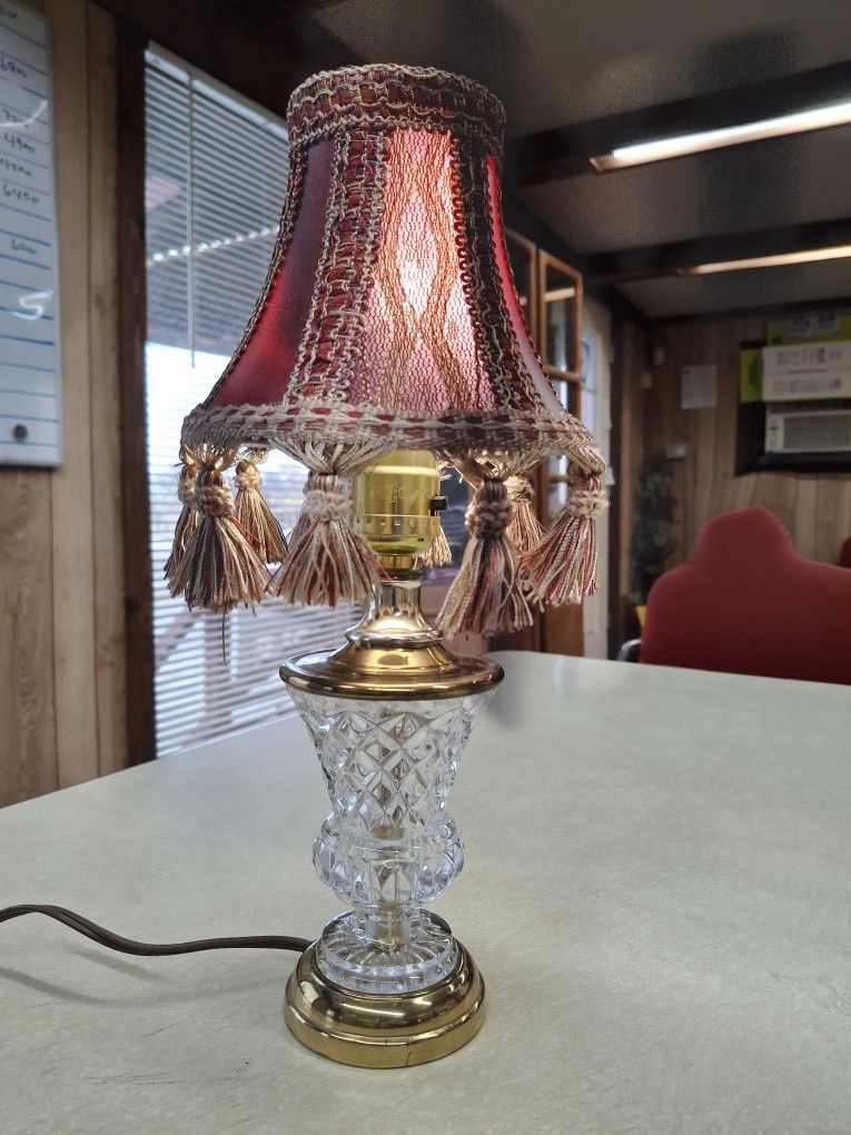 VERY UNIQUE LOOKING VINTAGE SMALL TABLE LAMP  BRASS AND GLASS  GOOD CONDITION 13.5 INCHES TALL  THIS LAMP WORKS GREAT  REALLY NEAT LOOKING SHADE 
