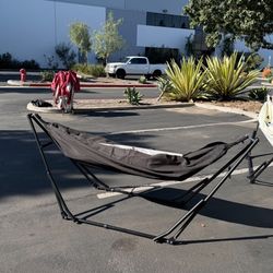 The New  In Box New Portable Hammock with Stand Included 500lbs Weight Capacity. Comes With Portable Carrying Bag. Navy Blue, Beige, Black, Gray