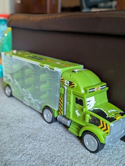 Big toy truck, with little trucks inside it