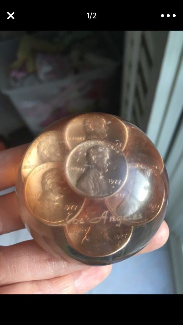 Old pennies paperweight
