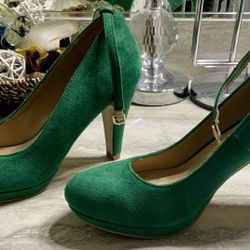 Gently Used Ugg Boots with snap on leg warmers Size 10. and Gently used Green Suede Type Green Baby Doll Shoes Size 9.5. Two Pair Bundle For  $30