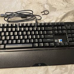 TLOTS Mechanical Keyboard Backlit Mechanical Gaming Keyboard for PC and Mac Gaming with Clicky Blue Switch Wrist Rest N-Key Rollover Adjustable Rainbo