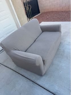 Red suede love seat Sofa with beige sofa cover