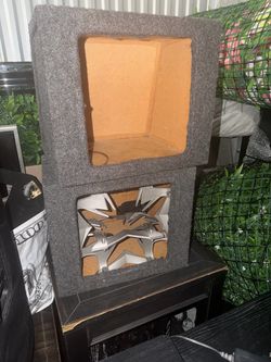 Kicker solobaric 12” speaker boxes with metal grill