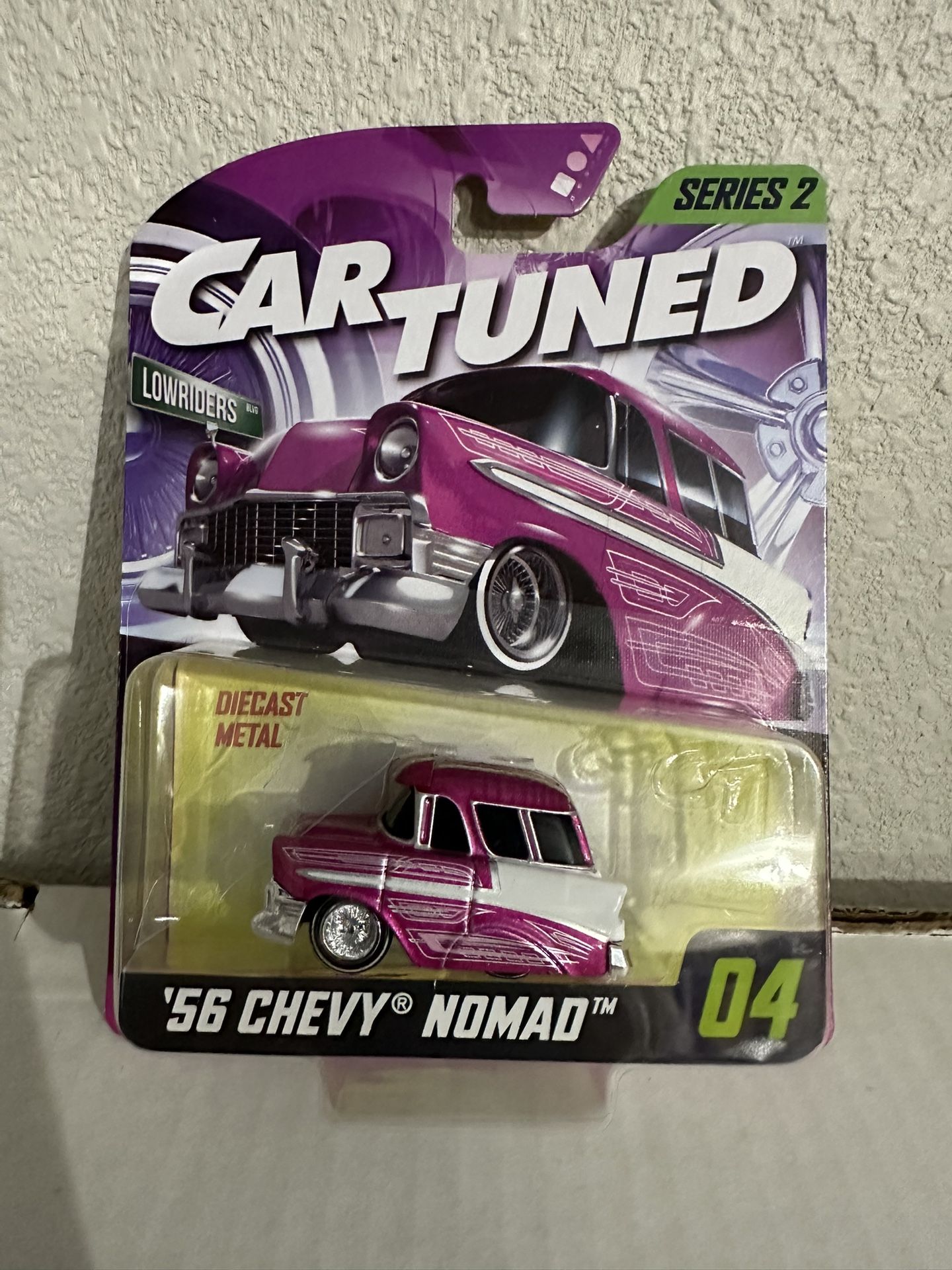Car Tuned ‘56 Chevy Nomad Pink 