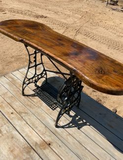 Beautiful epoxy, black, walnut, handmade table on a sewing stand