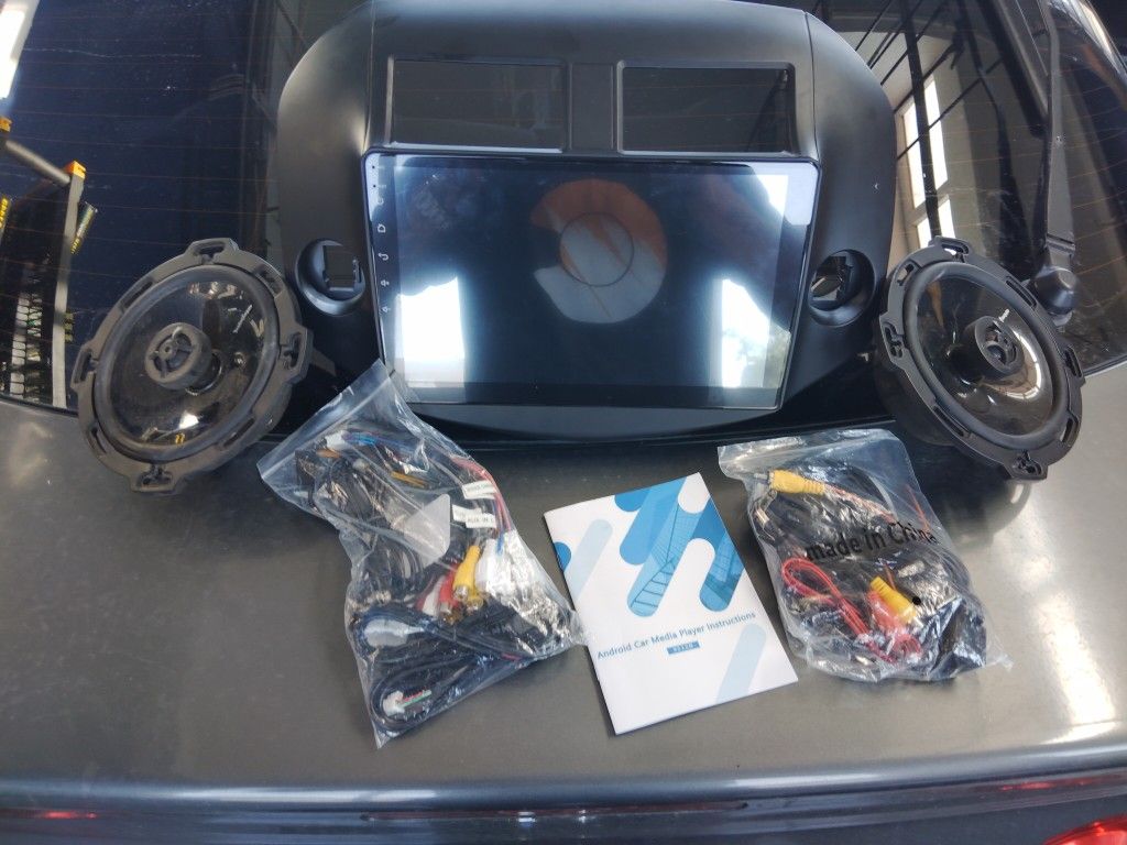 10 In Android Audio Touch Screen Brand New With All Wiring And Back Up Camera Setup Still In Package And I'm Also Throwing In 2 6x5 Rockford FosgaSpTo