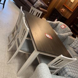 Table and four chairs with free bench 499 brand new cash only you must be able to load your own truck