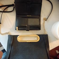 Black Michael Kors purse and matching wallet......