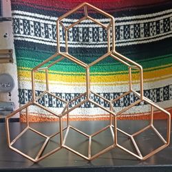 USED GOLD METAL WINE STAND