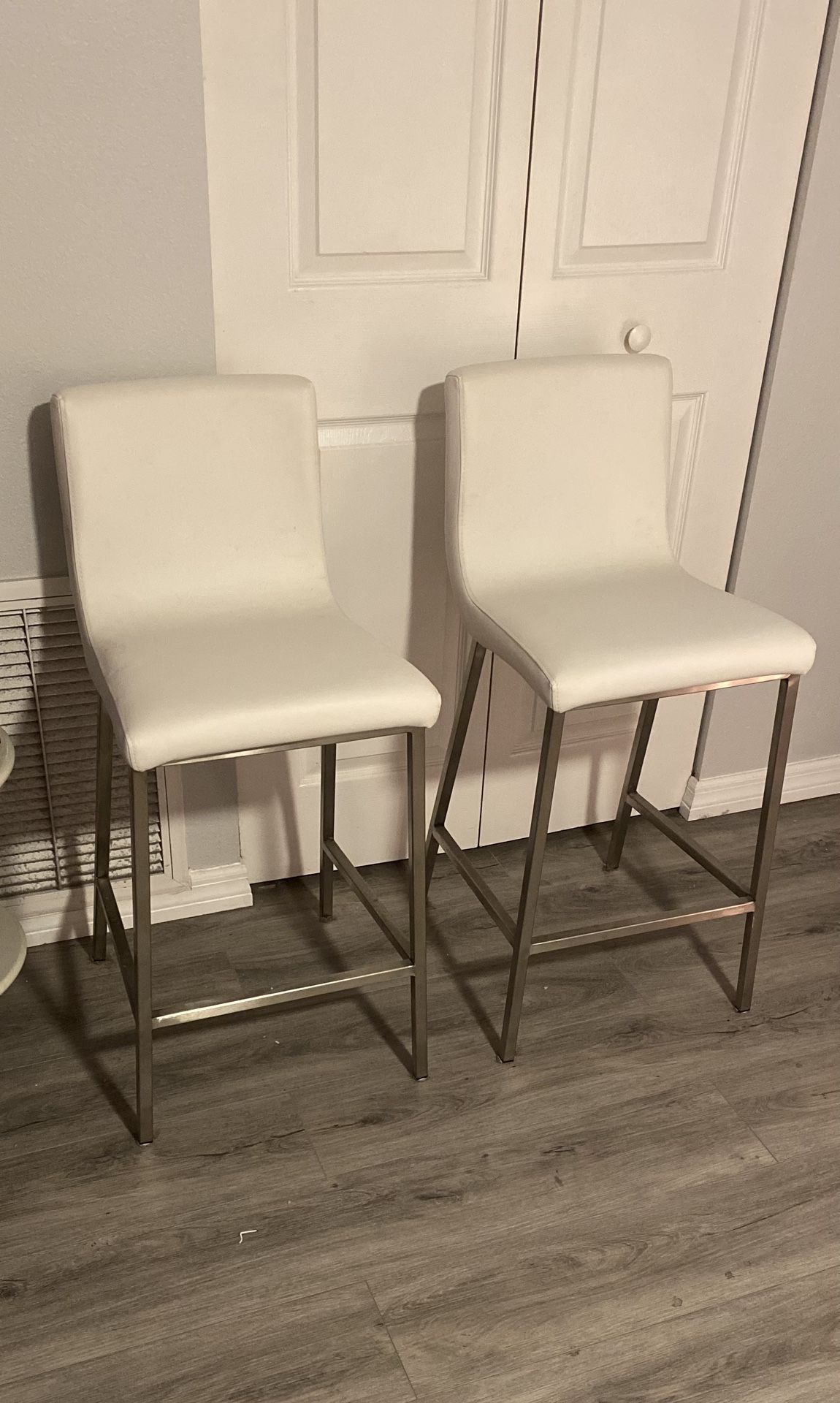 2 White Leather and Silver Bar Stools - $200 Total