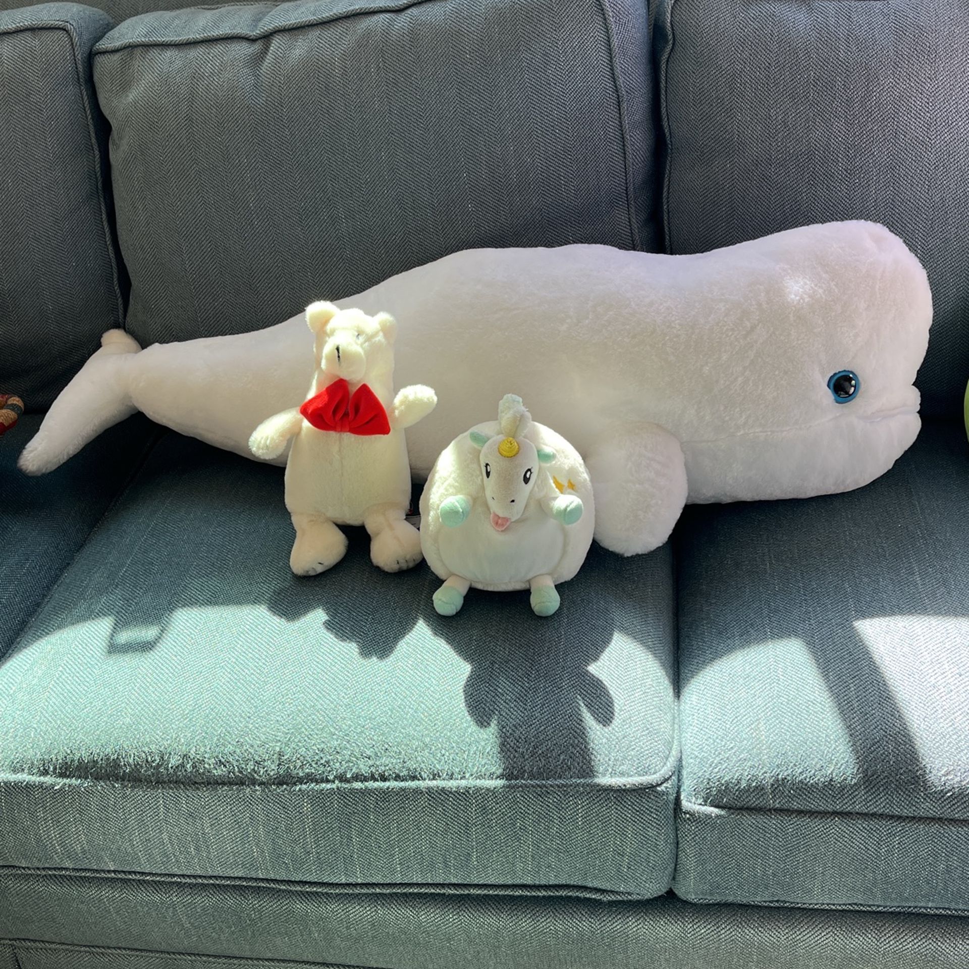 Stuffy Madness.  One large and two small stuffed animals.