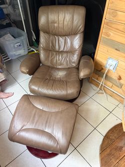 Leather recliner with otto man