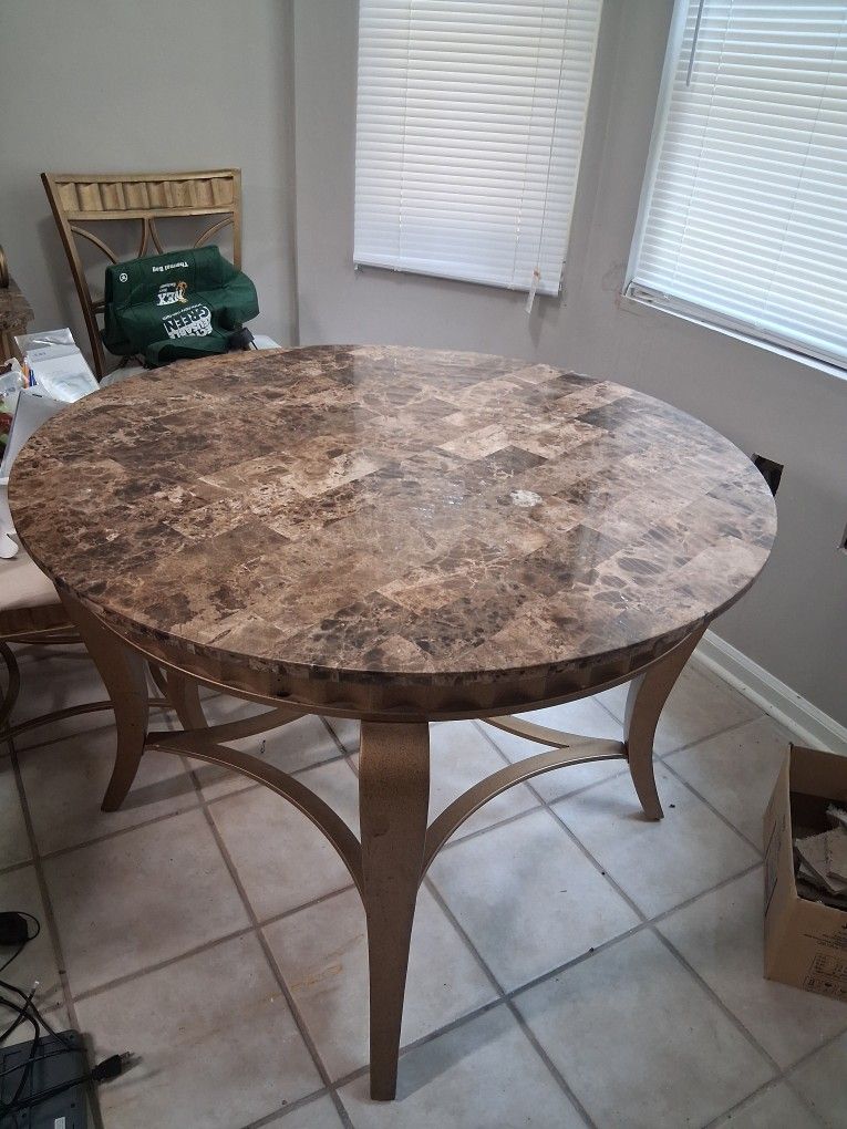 Stone Kitchen Table,  4 Matching Chairs,  And Matching Bakers Rack