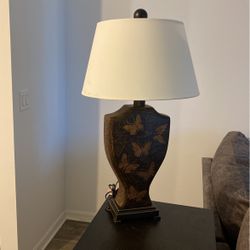 A lamb with butterflies