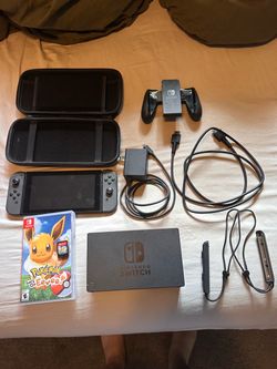 Original Nintendo Switch with all accessories and Pokémon Let’s Go Eevee