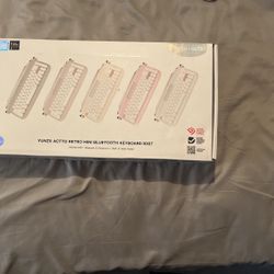 Keyboard With Built In Tablet Holder