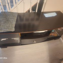 Tv Stand With 2 Glass Door And A Drawer 