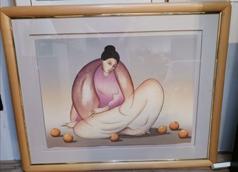 Woman with Oranges" framed art