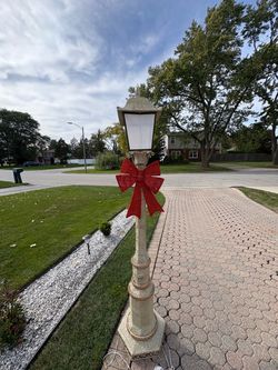 Outdoor Decorative Lamp Post with Red Bow