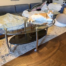 Mid Century Modern Glass Oval Coffee Table w/shelf & wheels