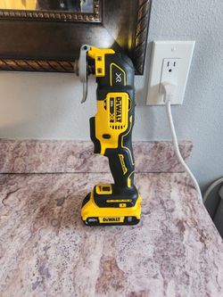 New Dewalt Multi-Tool with firm price battery