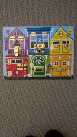 Melissa & Doug Latches Board
