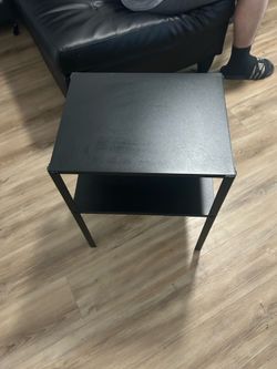 Black simple bedside table, about 2 ft