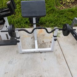 $125 Preacher curl Bar W/ Bench & Weights 