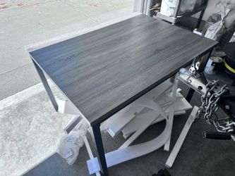 48x36 gray table in good condition