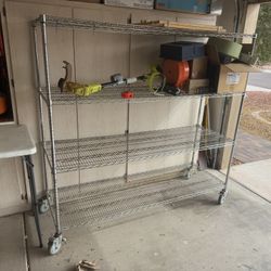 Four Metal Shelves Or Rack 69” Tall, 72” Long, 24” Deep
