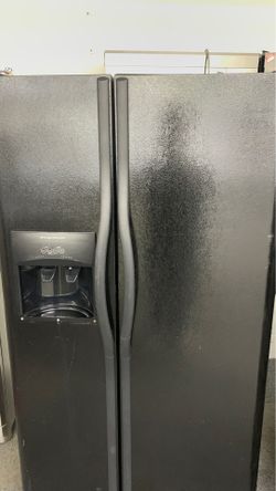 Frigidaire refrigerator side by side in black