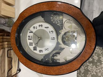 Smallworld Musical Clock