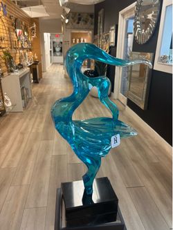 Modern aqua abstract sculpture with marble base