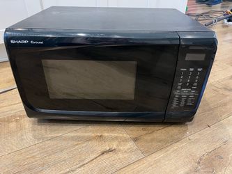Sharp Carousel Black Countertop Microwave (Model R-402KJ)