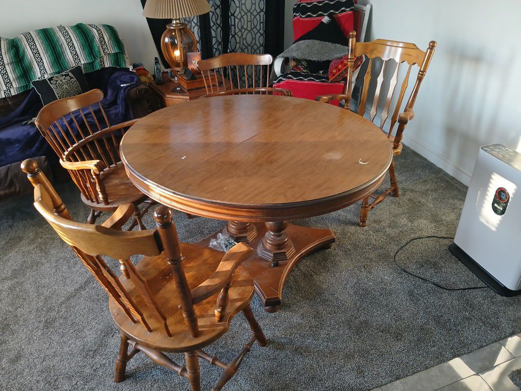 Kitchen table, four captain's chairs.