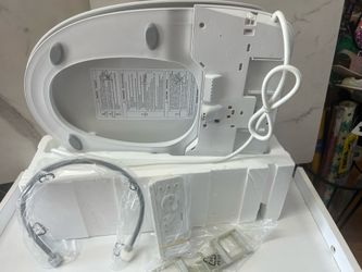 Smart Electric toilet seat solo le hace falta 2 piesas Que se mira en la foto del manual es Nueva