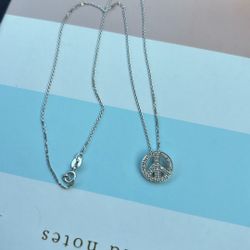 14 karat shite gold diamonds peace necklace 