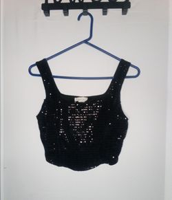 black sequin corset-style crop top