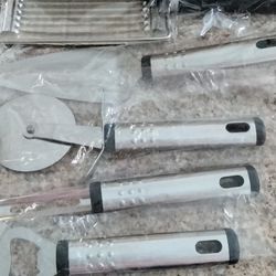 New 7 Pc. Silver Kitchen Utensils. 