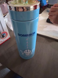 Light blue tumbler with tea filter