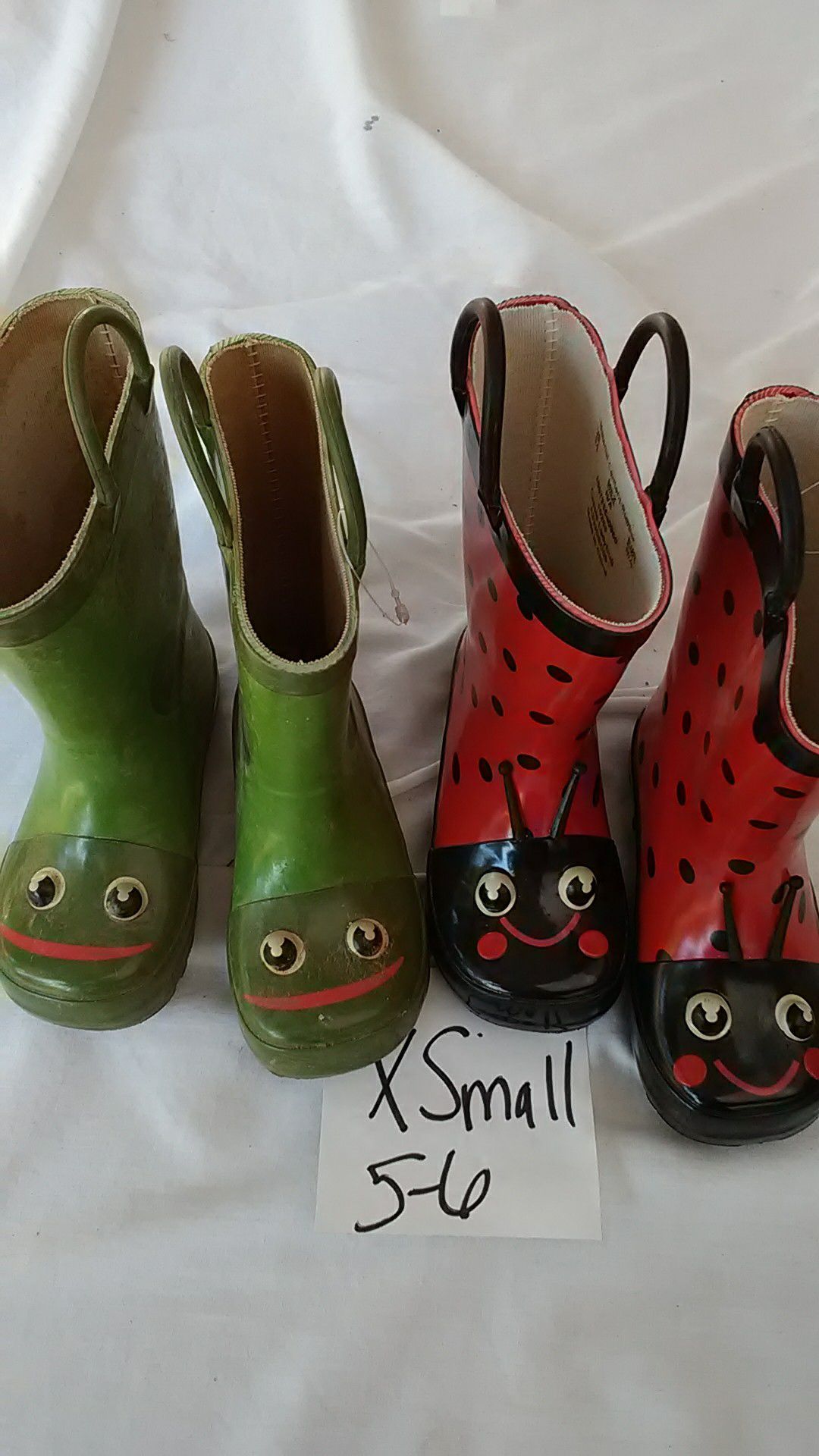 Rainy Boots Size XSmall 5/6 Frog &LadyBugg Both Played With never actually used for the rain Pre-Owned as is Take both for $5